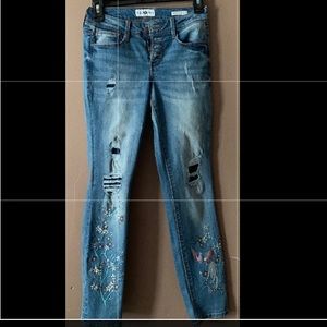 Black daisy floral denim jeans